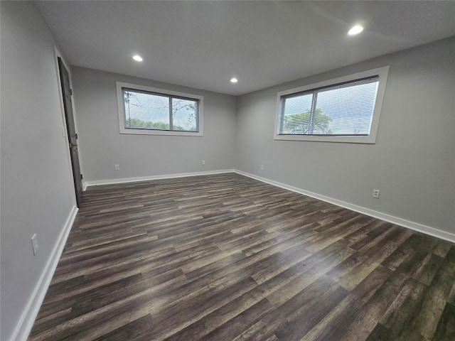507 W 1st St, Flatonia, TX 78941 - empty room with dark wood-style flooring and recessed lighting