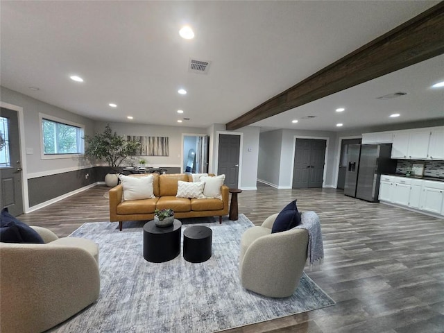 507 W 1st St, Flatonia, TX 78941 - living area featuring recessed lighting, dark wood-type flooring, and beamed ceiling