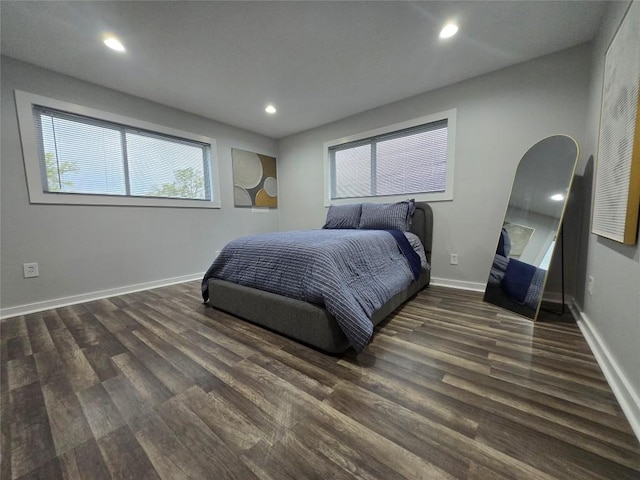 507 W 1st St, Flatonia, TX 78941 - bedroom with dark wood finished floors and recessed lighting