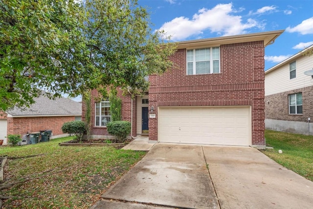 2319 Rock Ledge Dr, Georgetown, TX 78626 - traditional-style home with a garage, driveway, brick siding, and a front yard
