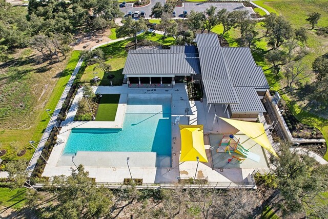 205 Alcatraz Loop, Jarrell, TX 76537 - aerial view of property and surrounding area featuring a pool area