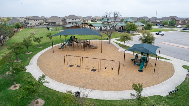 8021 Arezzo Dr, Round Rock, TX 78665 - communal playground featuring a residential view and a lawn