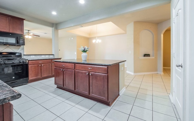 8021 Arezzo Dr, Round Rock, TX 78665 - kitchen featuring black appliances, arched walkways, light tile patterned flooring, backsplash, and recessed lighting