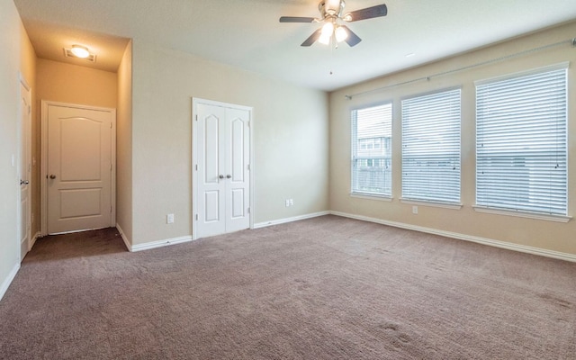 8021 Arezzo Dr, Round Rock, TX 78665 - unfurnished bedroom featuring carpet, baseboards, a closet, and ceiling fan