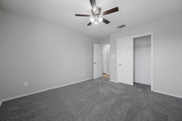 720 Northcreek Blvd, Leander, TX 78641 - unfurnished bedroom featuring dark carpet, ceiling fan, and a closet
