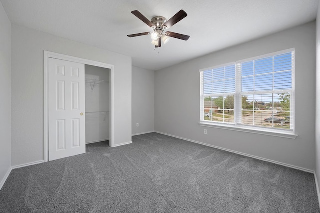720 Northcreek Blvd, Leander, TX 78641 - unfurnished bedroom featuring dark carpet, a closet, and ceiling fan