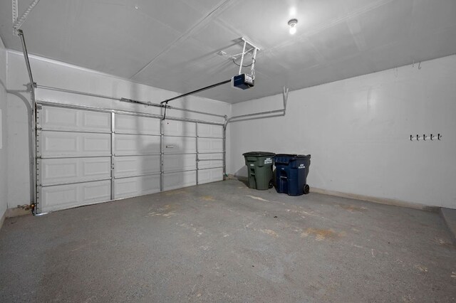 720 Northcreek Blvd, Leander, TX 78641 - garage featuring a garage door opener