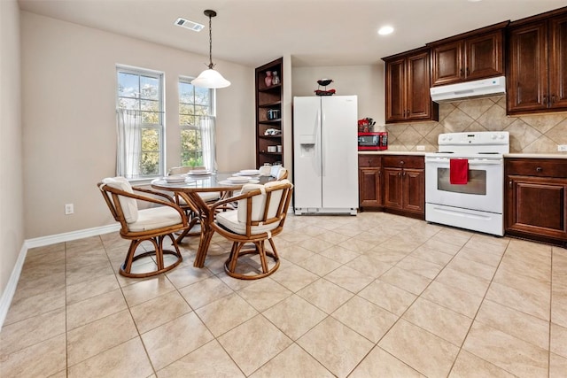 1135 Twisted Oak Ct, Canyon Lake, TX 78133 - kitchen featuring white appliances, under cabinet range hood, light countertops, decorative backsplash, and recessed lighting