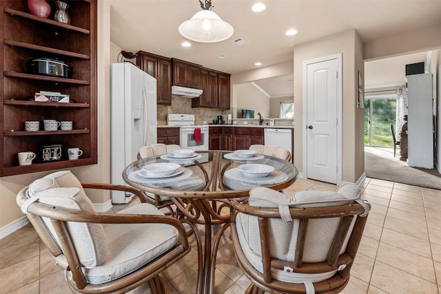 1135 Twisted Oak Ct, Canyon Lake, TX 78133 - dining space featuring light tile patterned flooring and recessed lighting