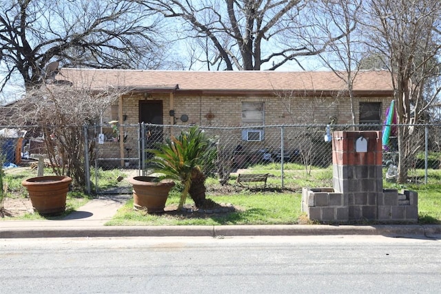110 Hergotz Ln, Austin, TX 78742 - ranch-style house featuring brick siding and a gate