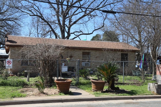 110 Hergotz Ln, Austin, TX 78742 - ranch-style house with brick siding and a shingled roof