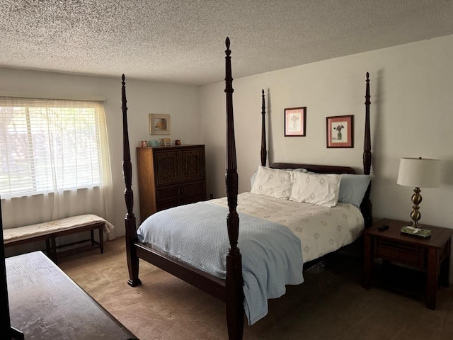 11202 Balcones Woods Cv, Austin, TX 78759 - bedroom with a textured ceiling