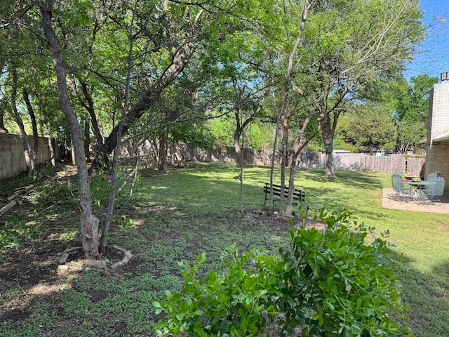 11202 Balcones Woods Cv, Austin, TX 78759 - fenced backyard featuring a patio area