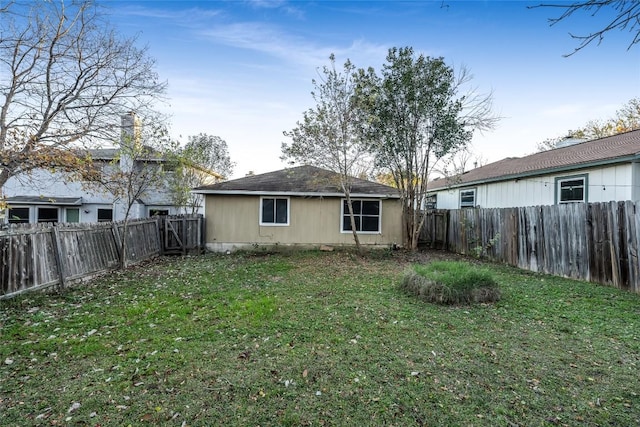 8802 Peppergrass Cv, Austin, TX 78745 - back of property featuring a fenced backyard