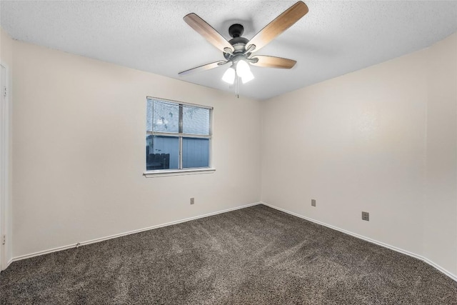 8802 Peppergrass Cv, Austin, TX 78745 - unfurnished room with dark colored carpet, ceiling fan, and a textured ceiling