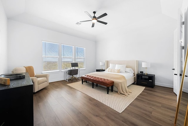 bedroom with baseboards, a ceiling fan, dark wood-style flooring, and visible vents