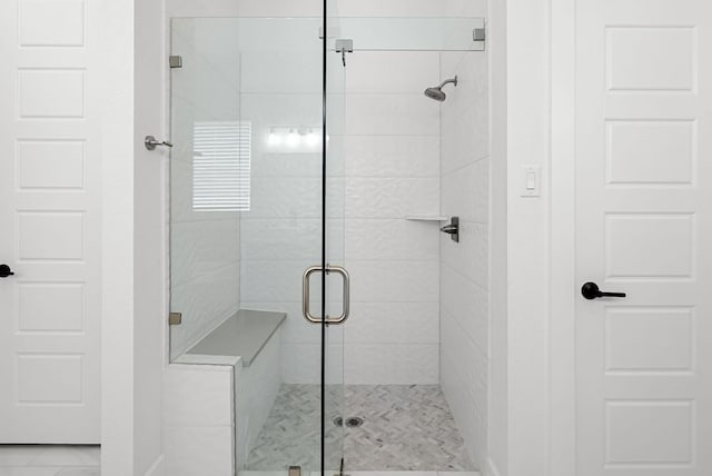 bathroom featuring a stall shower