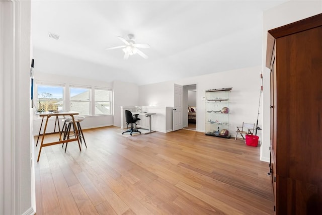 10005 Cormorant Cv, Austin, TX 78730 - home office with a ceiling fan, light wood-type flooring, and baseboards