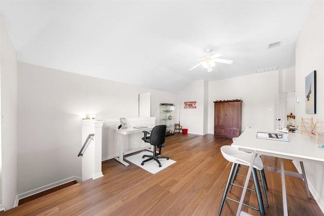 10005 Cormorant Cv, Austin, TX 78730 - office area featuring vaulted ceiling, a ceiling fan, wood finished floors, and baseboards