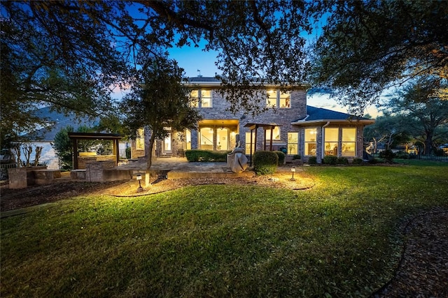 10005 Cormorant Cv, Austin, TX 78730 - back of house with a lawn