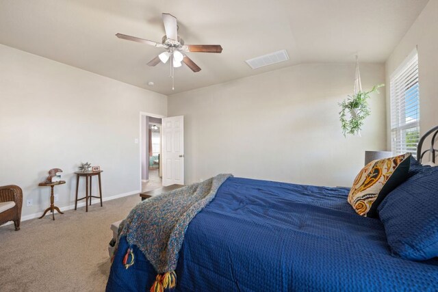2125 Conner Dr, New Braunfels, TX 78130 - bedroom featuring carpet flooring, baseboards, a ceiling fan, and vaulted ceiling