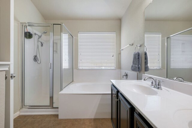 2125 Conner Dr, New Braunfels, TX 78130 - full bath featuring a stall shower, a garden tub, and double vanity