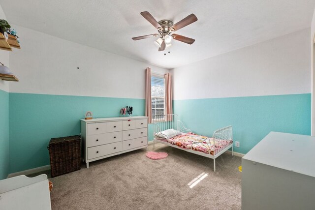 2125 Conner Dr, New Braunfels, TX 78130 - carpeted bedroom featuring a ceiling fan