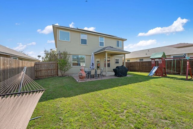 2125 Conner Dr, New Braunfels, TX 78130 - back of property featuring a patio area and a playground