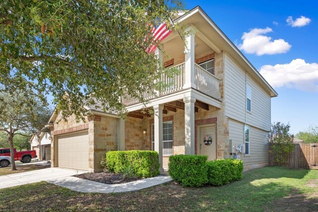 2125 Conner Dr, New Braunfels, TX 78130 - view of front of property featuring a balcony, stone siding, concrete driveway, and an attached garage