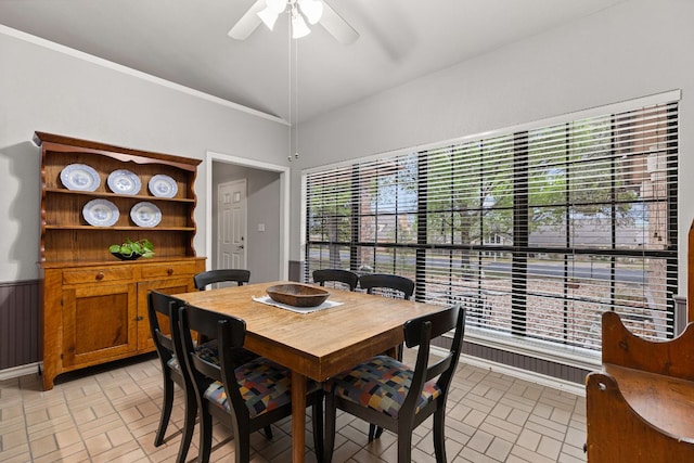 3806 Eagle Way, Round Rock, TX 78681 - dining space featuring brick patterned flooring, a ceiling fan, and wainscoting