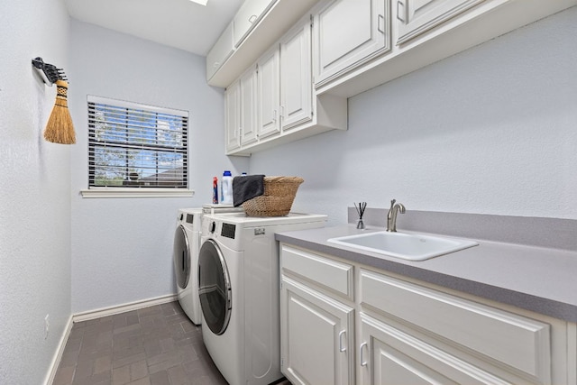3806 Eagle Way, Round Rock, TX 78681 - laundry area featuring cabinet space, washer and clothes dryer, baseboards, and brick patterned floors