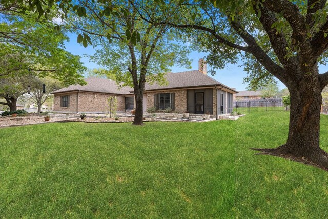 3806 Eagle Way, Round Rock, TX 78681 - view of front of home featuring a chimney and a sunroom