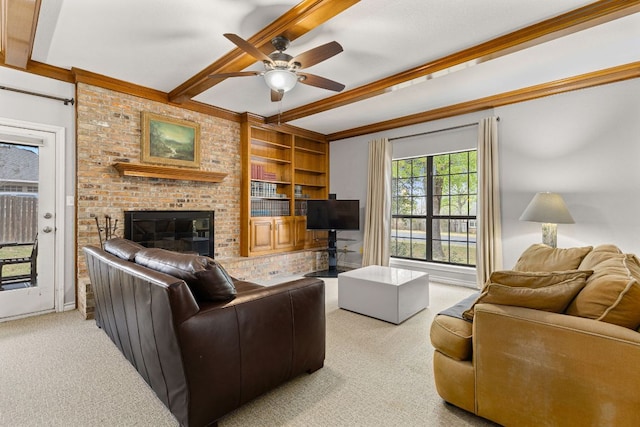 3806 Eagle Way, Round Rock, TX 78681 - living area with beam ceiling, carpet flooring, a ceiling fan, a fireplace, and built in shelves