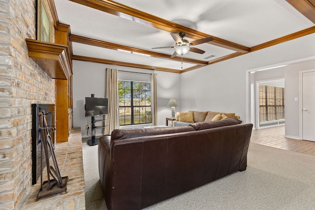 3806 Eagle Way, Round Rock, TX 78681 - living area with a ceiling fan, a brick fireplace, light carpet, beamed ceiling, and ornamental molding