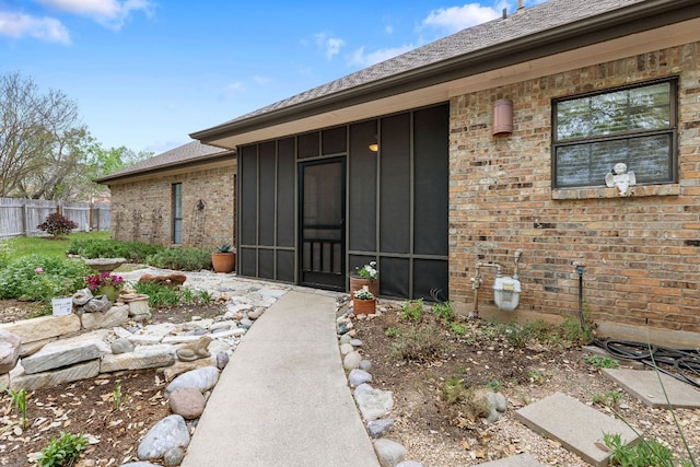 3806 Eagle Way, Round Rock, TX 78681 - view of exterior entry featuring fence, board and batten siding, and brick siding