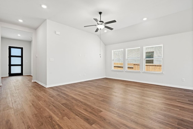 341 Fawn River Run, Kyle, TX 78640 - spare room featuring a ceiling fan, wood finished floors, baseboards, recessed lighting, and lofted ceiling