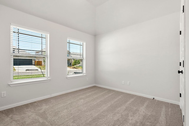 341 Fawn River Run, Kyle, TX 78640 - empty room with carpet floors, lofted ceiling, and baseboards