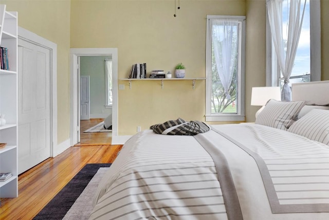 bedroom featuring wood finished floors