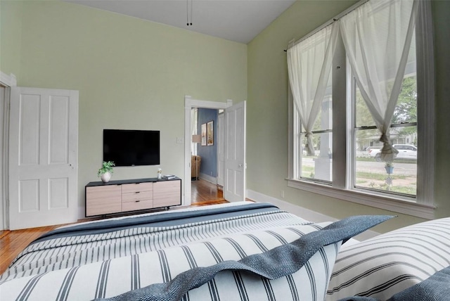 501 Burleson St, Smithville, TX 78957 - bedroom with wood finished floors and baseboards