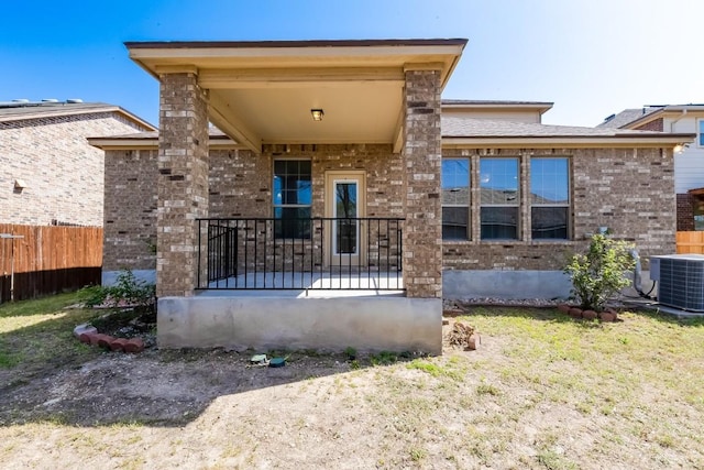 868 Water Hyacinth Loop, Leander, TX 78641 - rear view of property with brick siding