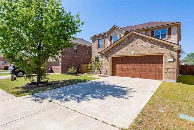868 Water Hyacinth Loop, Leander, TX 78641 - view of front facade featuring a garage, concrete driveway, and brick siding