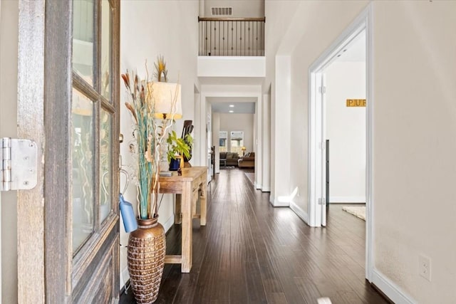 2316 Centennial Loop, Round Rock, TX 78665 - entryway featuring baseboards and dark wood-type flooring