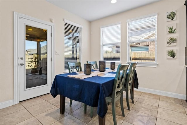 2316 Centennial Loop, Round Rock, TX 78665 - dining space with baseboards and light tile patterned flooring
