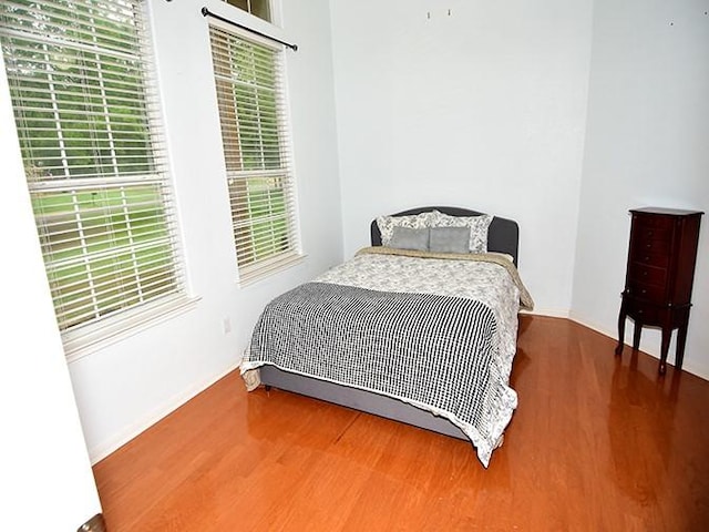159 Moku Manu Dr, Bastrop, TX 78602 - bedroom with wood finished floors