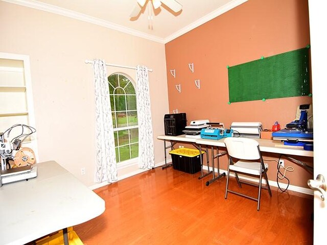 159 Moku Manu Dr, Bastrop, TX 78602 - home office with wood finished floors, crown molding, and a ceiling fan