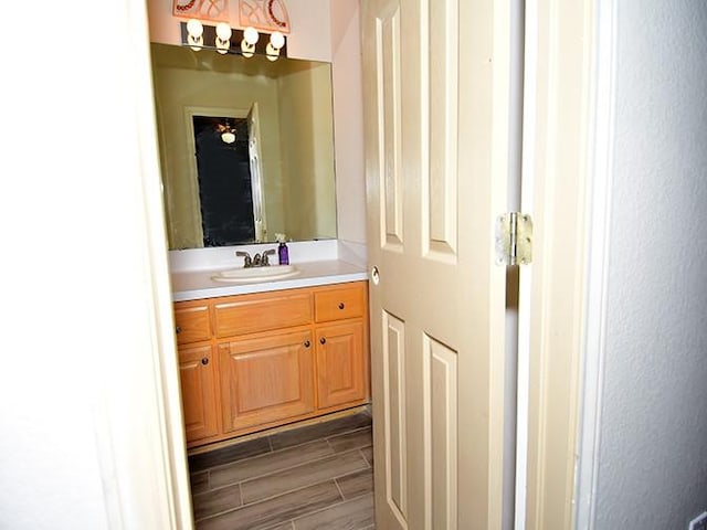 159 Moku Manu Dr, Bastrop, TX 78602 - bathroom featuring vanity and wood tiled floors
