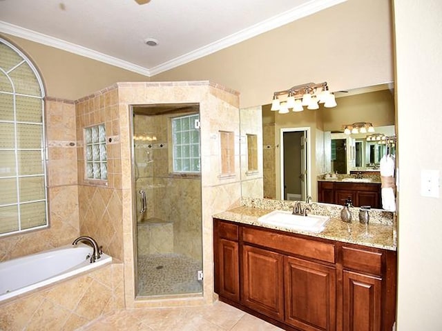 159 Moku Manu Dr, Bastrop, TX 78602 - bathroom with a stall shower, a bath, vanity, crown molding, and tile patterned floors