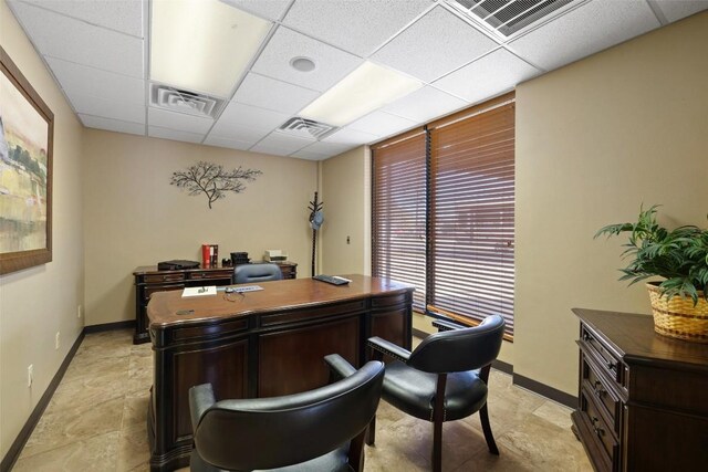 401 Main St, Blanco, TX 78606 - office with a paneled ceiling and baseboards