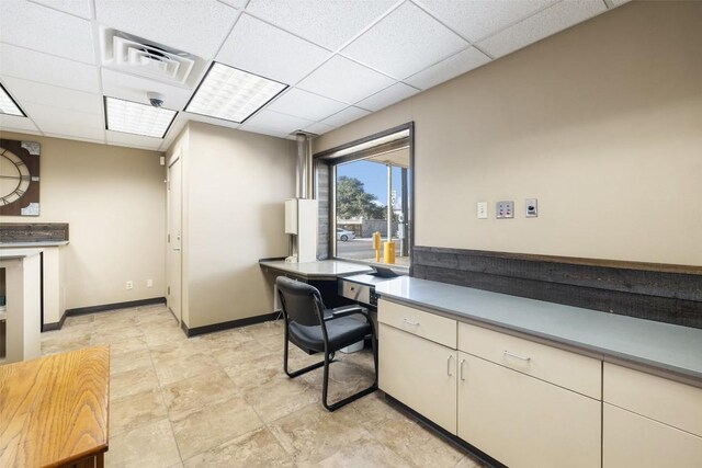 401 Main St, Blanco, TX 78606 - kitchen with a drop ceiling and light countertops