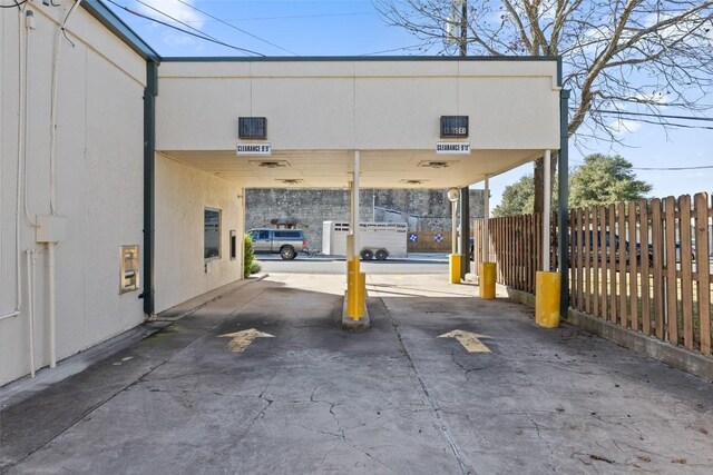 401 Main St, Blanco, TX 78606 - view of car parking featuring a carport